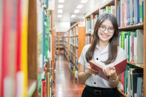 literacy-and-numeracy-girl-in-library how to improve literacy and numeracy skills