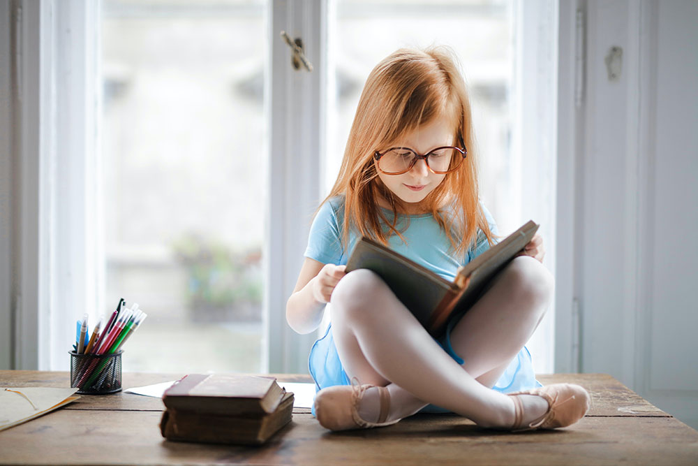 child reading book