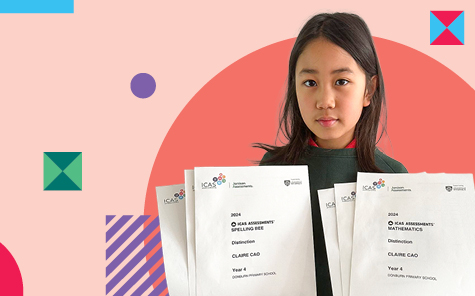 girl with her icas results and certificates