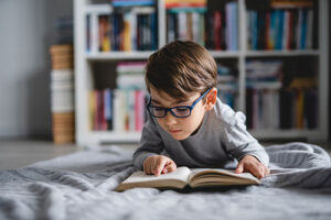 child reading a book
