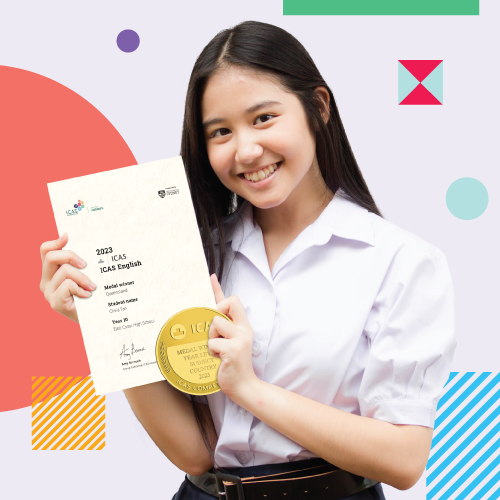 Girl with ICAS certificate and medal
